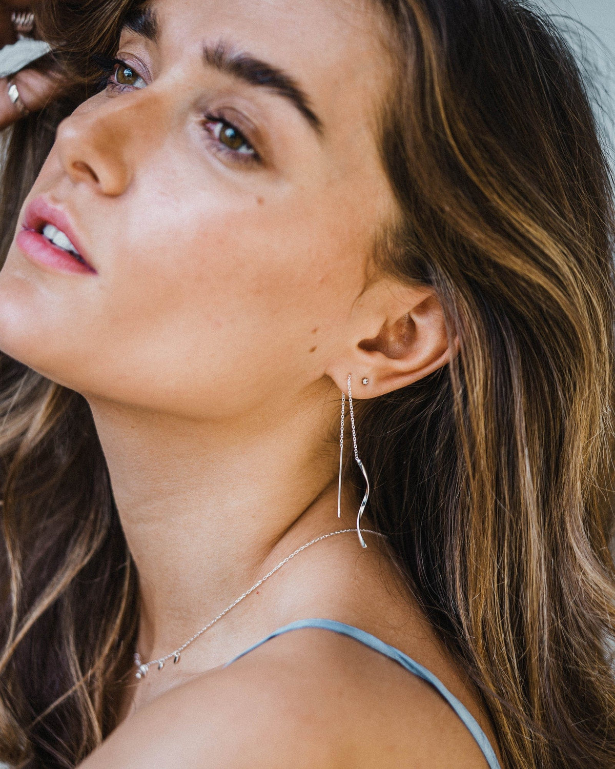 Sterling Silver Elegant Twist Pull-Through Earrings